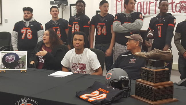 Chaparral senior Richard Nelson is flanked by his mother, Roxanne Bruce, and Chaparral coach ...