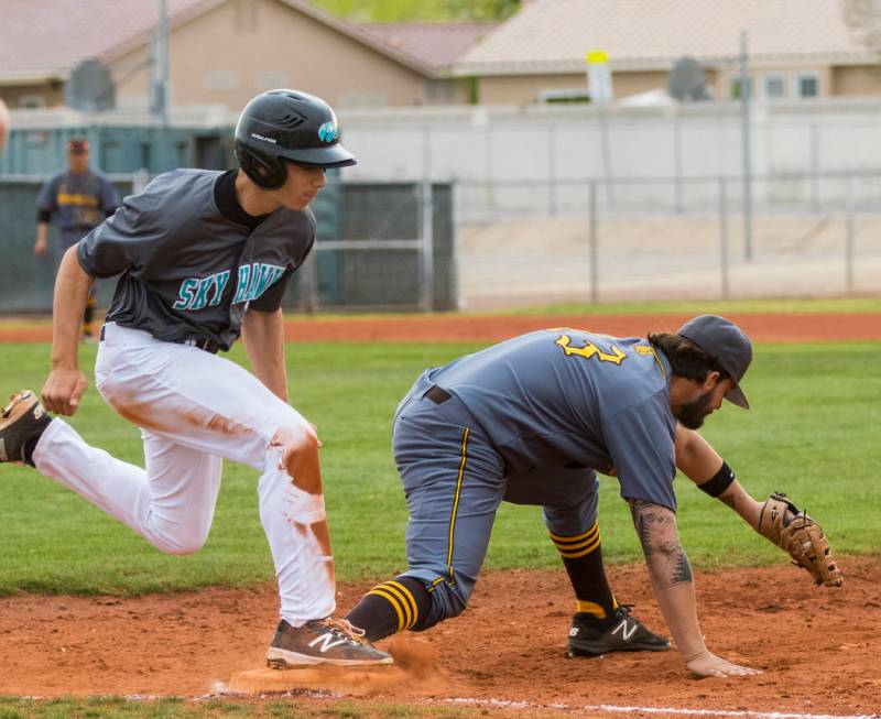 Bonanza first baseman Danny Ruiz (13) tags Silverado pitcher Christian Hernandez (32) out in ...