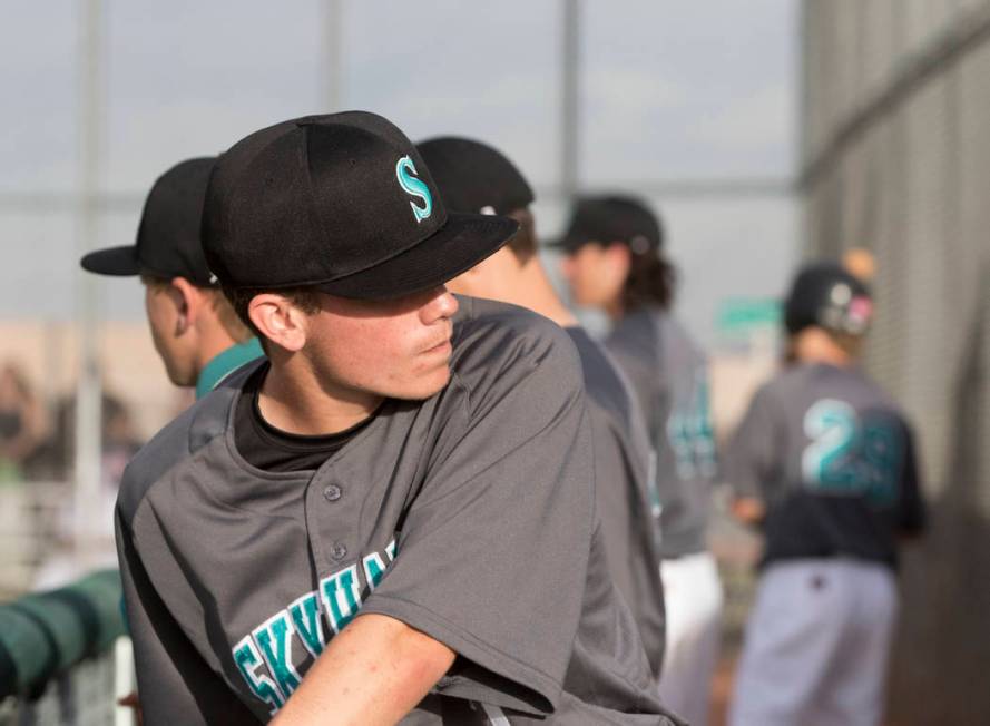 The Silverado High School baseball team waits in the dugout during a baseball game against B ...