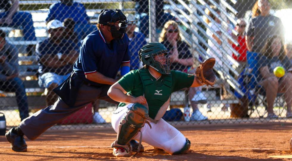 Palo Verde catcher Grace Chavez (25) catches the ball in the sixth inning during a softball ...