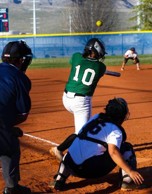 Palo Verde infielder Richmond Garcia (10) hits the ball in the sixth inning during a softbal ...