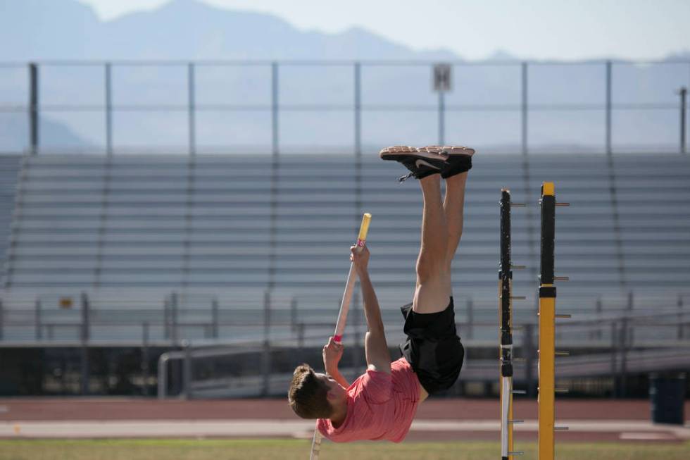 Garett Furlong practices pole vaulting during a track and field practice at Coronado High Sc ...