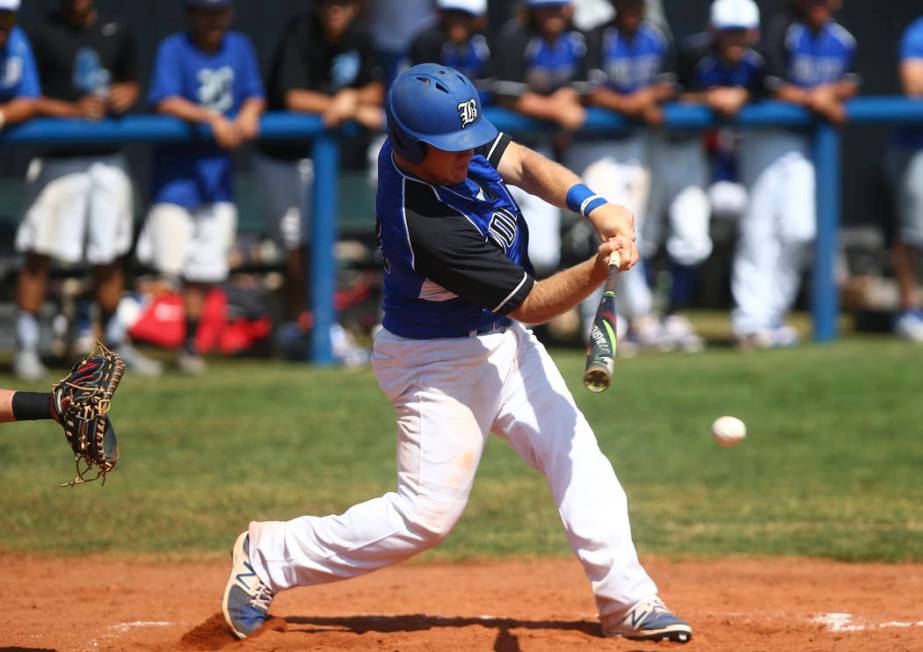 Basic’s Trace Evans (18) bats against Santa Margarita during a baseball game at Basic ...