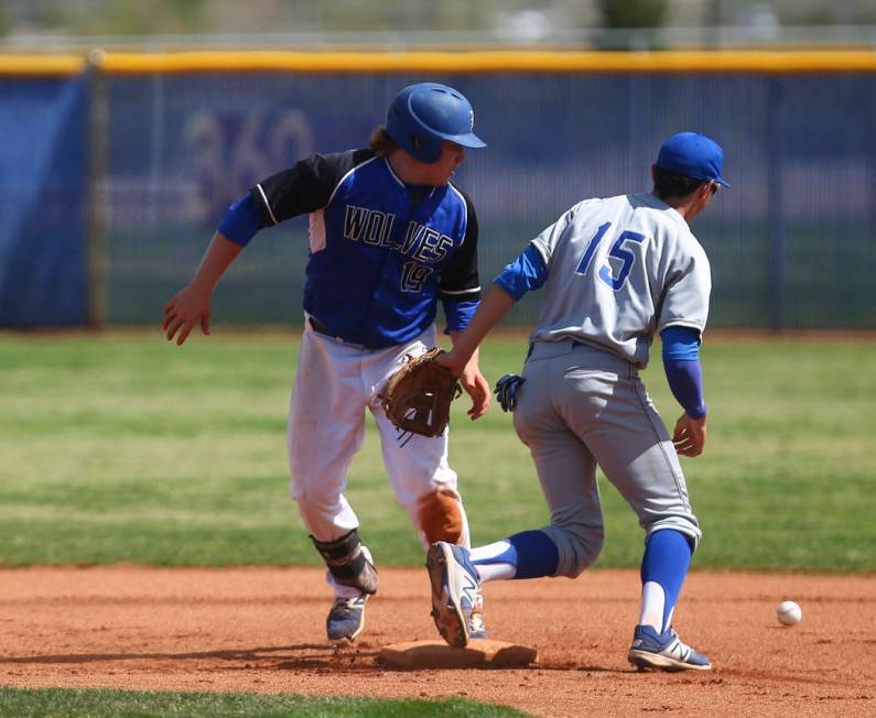 Basic’s Jack Wold (19) makes it safely to second base against Santa Margarita’s ...