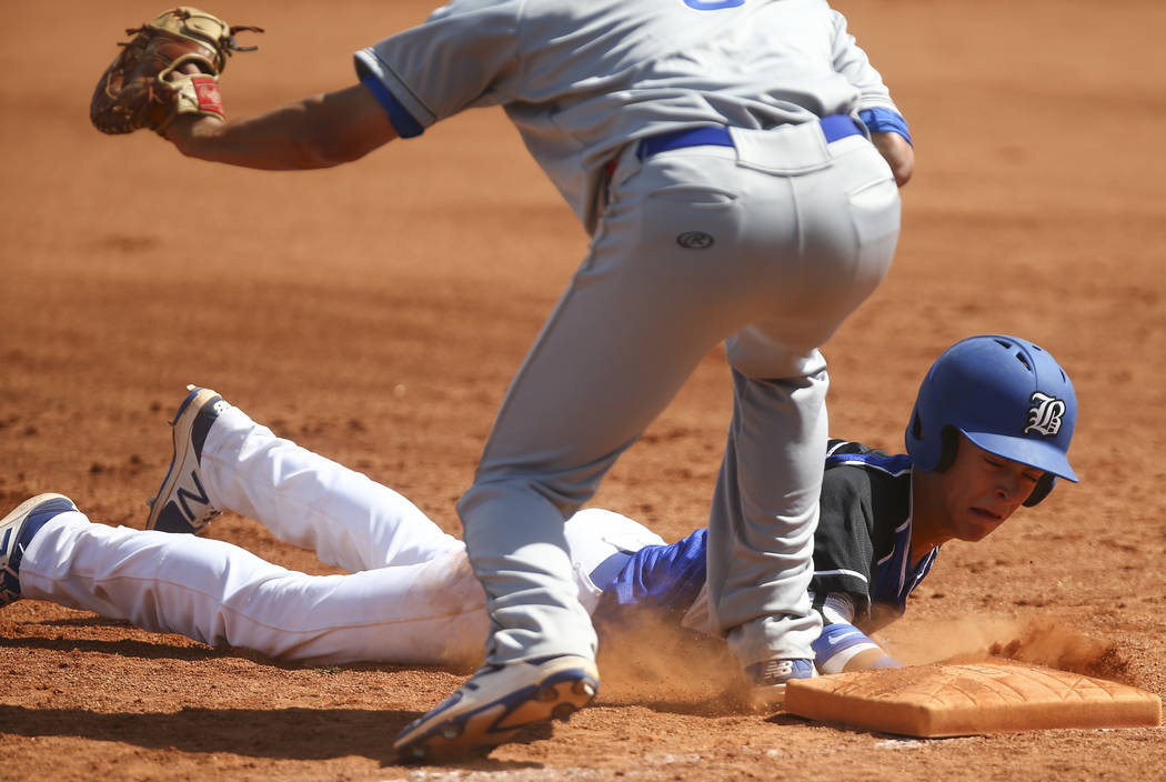 Basic’s John Howard Bobo (6) slides back into first base to stay safe against Santa M ...