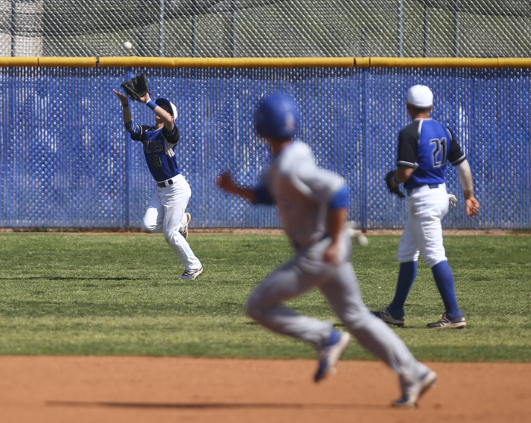 Basic’s Kyle Turner (8) catches a fly ball from Santa Margarita during a baseball game ...