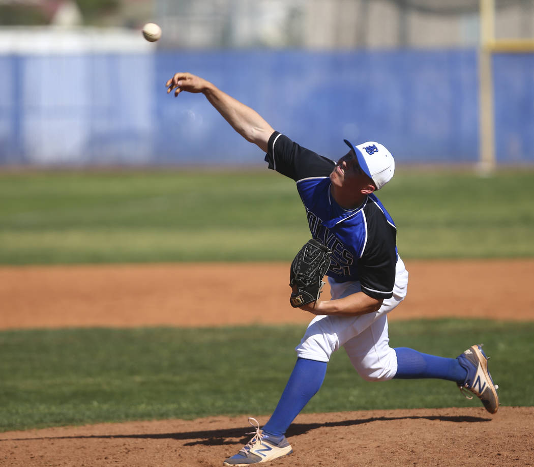 Basic’s Paul Myro (21) pitches to Santa Margarita during a baseball game at Basic High ...