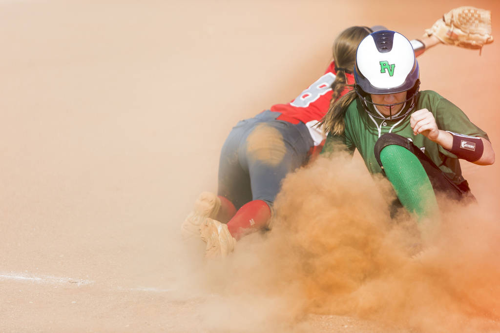 Palo Verde’s Makena Martin, right, slides into third base successfully as Arbor View&# ...