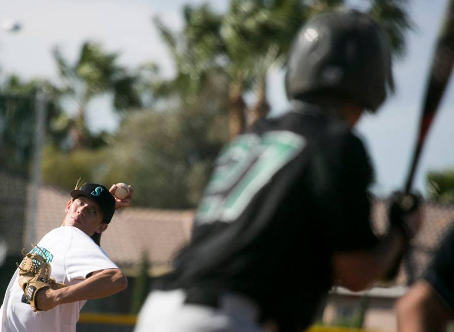 Silverado senior Kevin Pindel (28) pitches to Rancho at Silverado High School on Tuesday, Ma ...