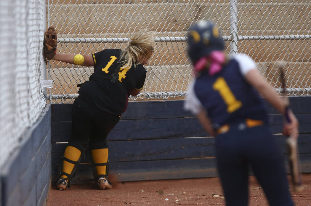 Pahrump’s Jordan Egan (14) misses a foul ball from Boulder City’s Ellie Ramsey ( ...