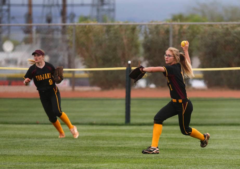 Pahrump’s Terrena Martin (1) looks to throw after catching a fly ball from Boulder Cit ...