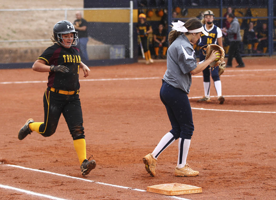 Pahrump’s Samantha Riding (10) is tagged out by Boulder City’s Jordan Moorhead ( ...