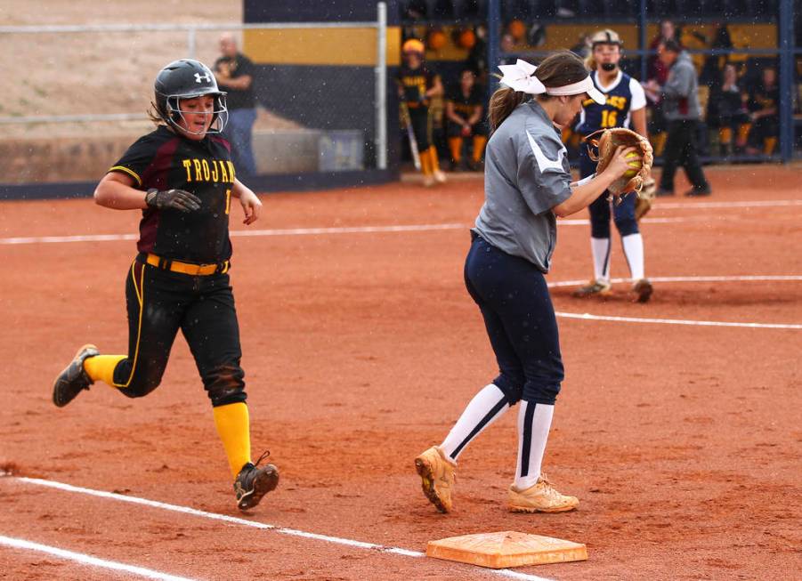 Pahrump’s Samantha Riding (10) is tagged out by Boulder City’s Jordan Moorhead ( ...