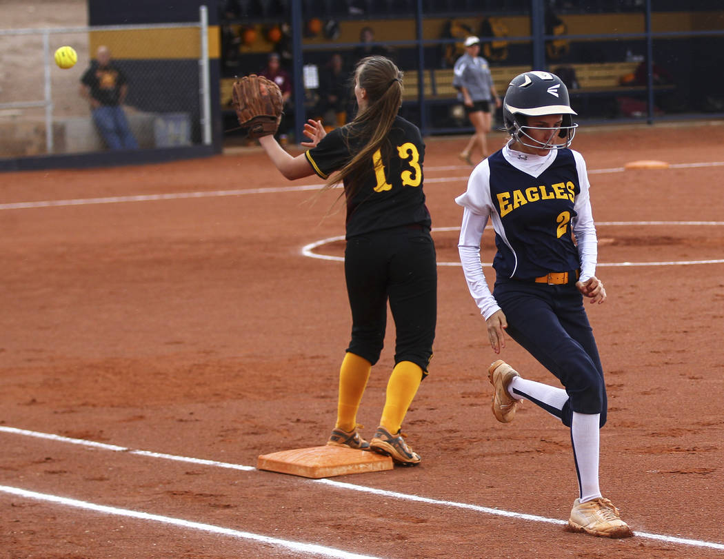 Boulder City’s Ryann Reese (2) makes it safely to first base against Pahrump’s J ...