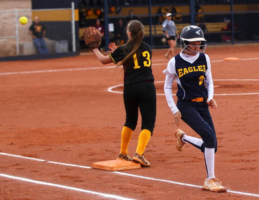 Boulder City’s Ryann Reese (2) makes it safely to first base against Pahrump’s J ...