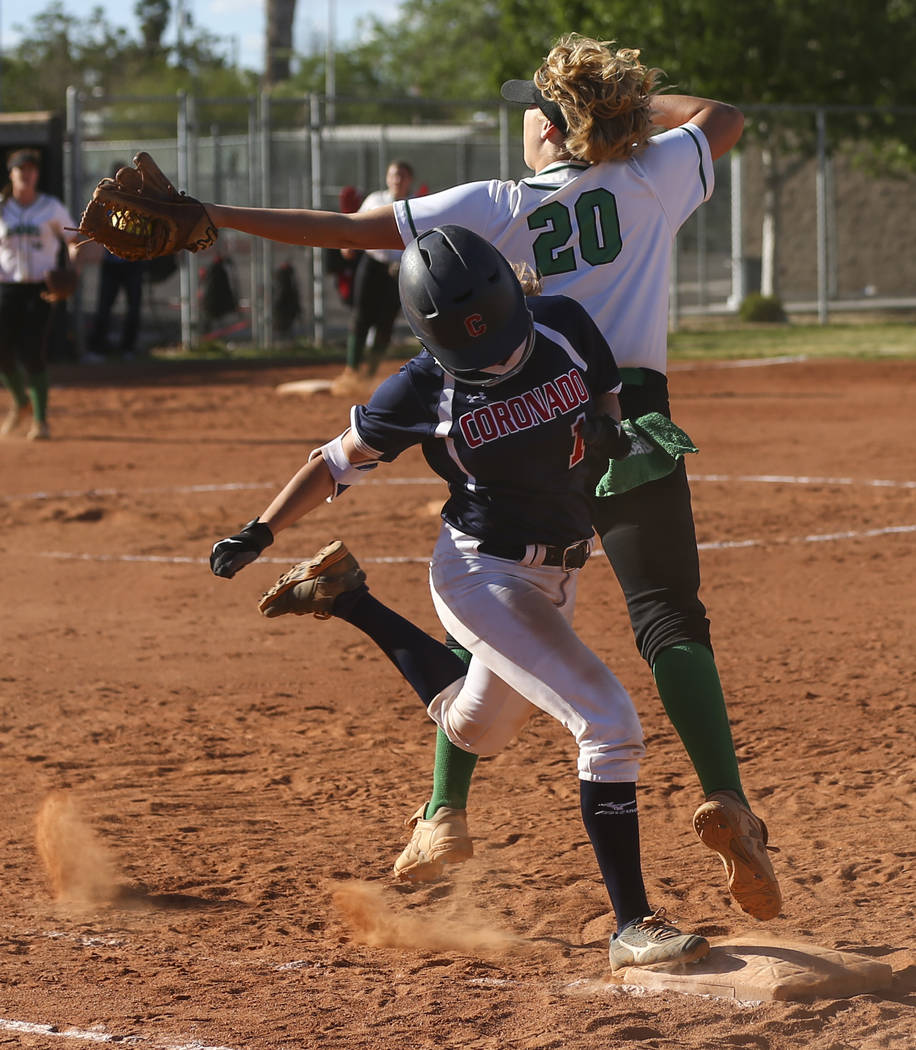 Coronado’s Erica Hardy (1) makes it to first base against Rancho’s MacKenzie Per ...