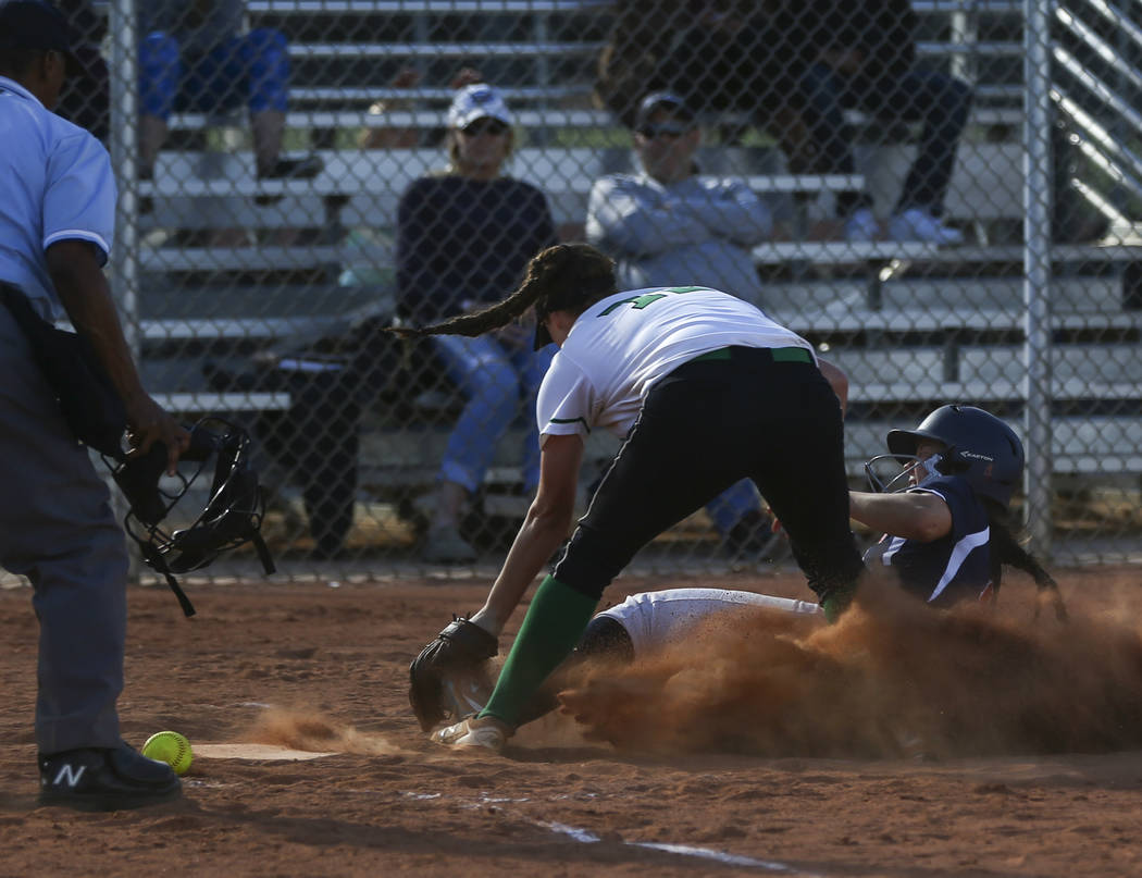 Coronado’s Dylan Underwood (4) scores a run against Rancho’s Sam Pochop (72) dur ...