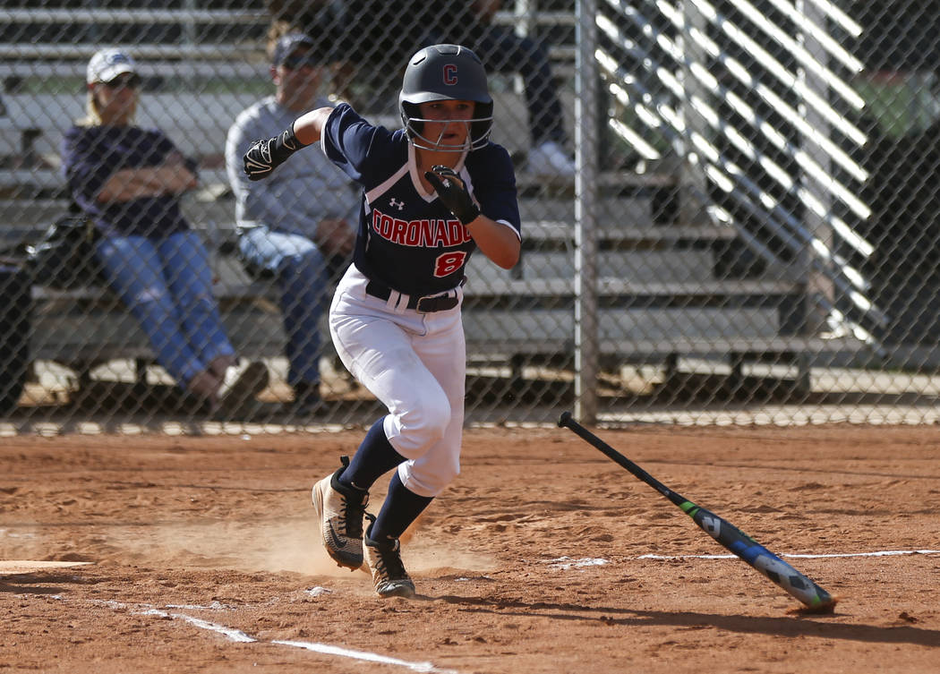 Coronado’s Marissa Kopp (8) runs for first base after bunting the ball during a softba ...