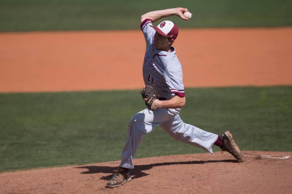 Desert Oasis Brett Brocoff (11) pitches against Bishop Gorman at Bishop Gorman High School o ...