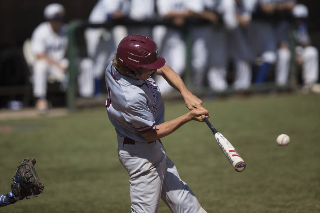 Desert Oasis Parker Schmidt (4) swings the bat against Bishop Gorman at Bishop Gorman High S ...