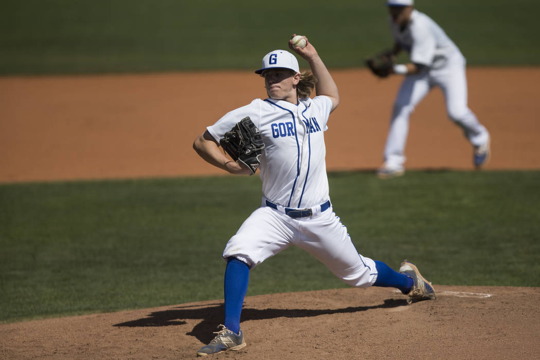 Bishop Gorman’s Jarrod Billig (26) pitches the ball against Desert Oasis on Saturday, ...