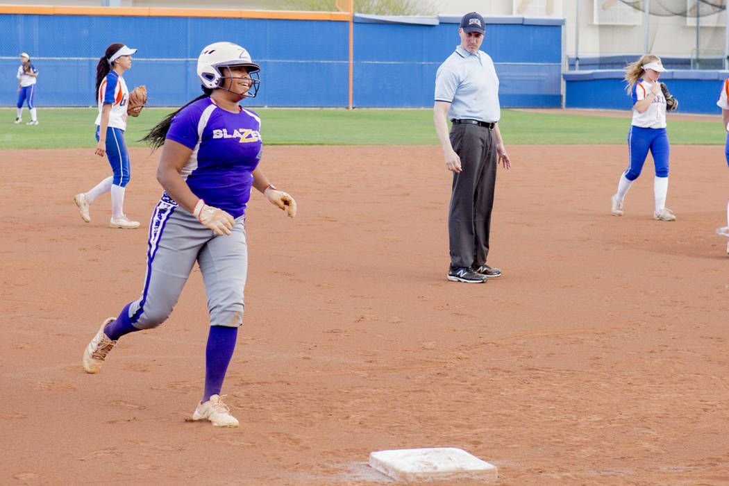 Durango’s Trinity Valentine (4) runs after hitting a home run against Bishop Gorman at ...