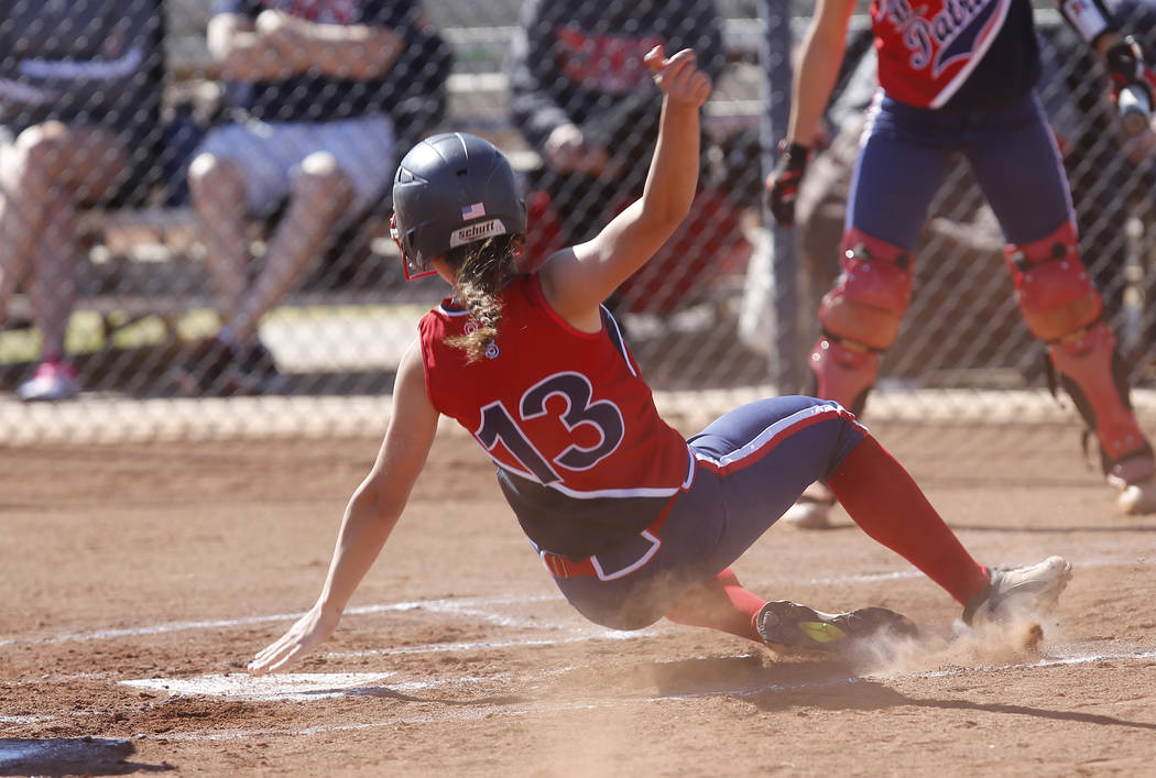 Liberty’s Ashleigh Rodriguez (13) scores a run against Coronado during the first innin ...