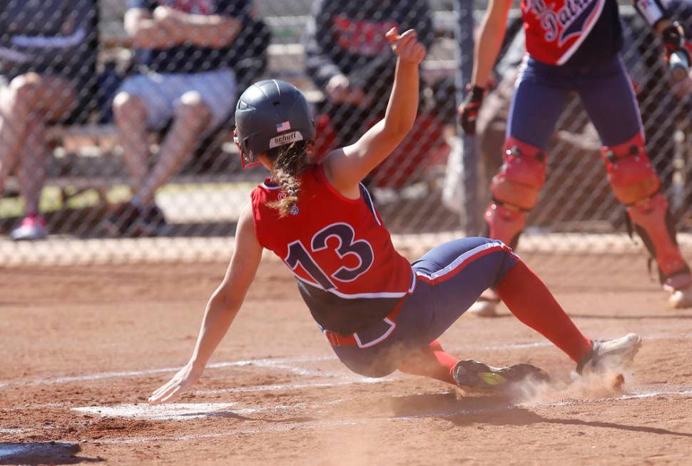 Liberty’s Ashleigh Rodriguez (13) scores a run against Coronado during the first innin ...