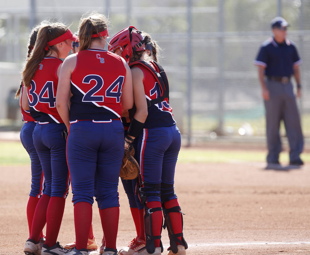 Liberty players huddle during a high school softball game against Coronado at Coronado High ...