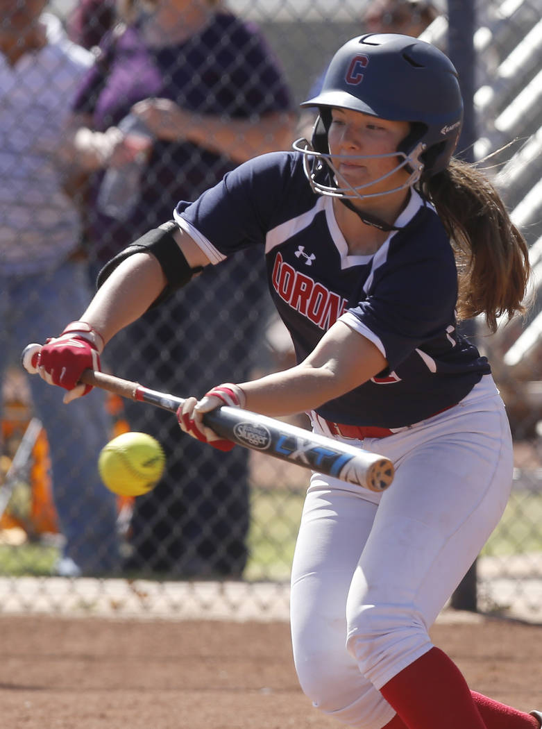 Coronado’s Dylan Underwood (4) bunts during the third inning of a high school softball ...