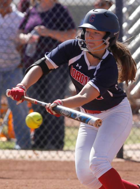 Coronado’s Dylan Underwood (4) bunts during the third inning of a high school softball ...