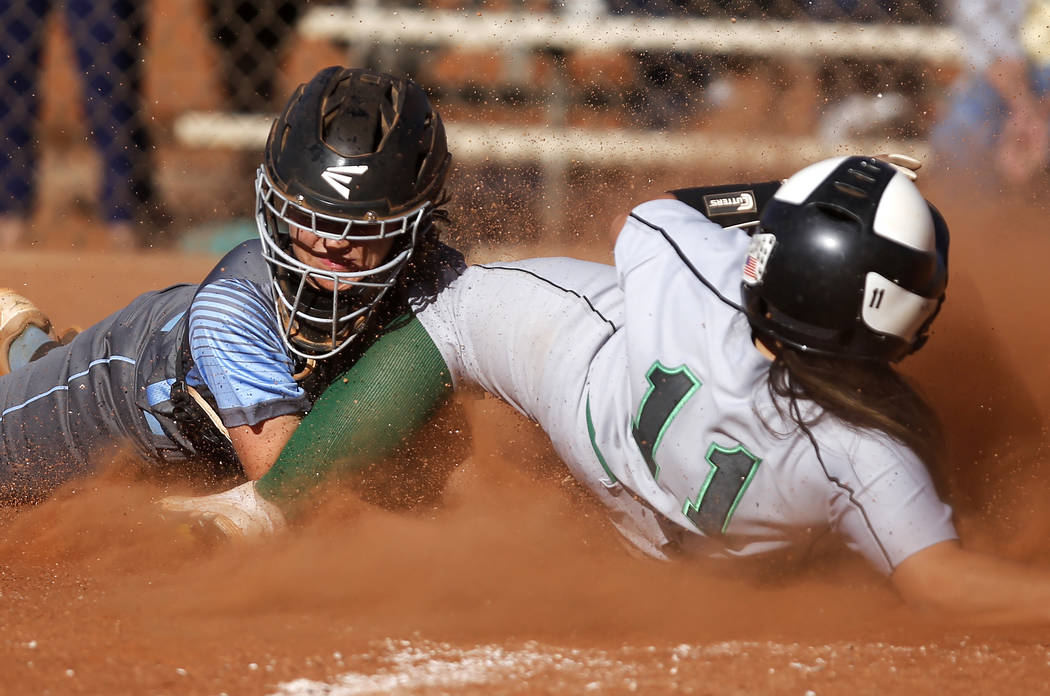 Palo Verde’s Keyana Neveu (11) clashes with Centennial’s Makenzie Ball (9) as Ne ...