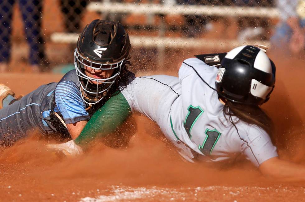 Palo Verde’s Keyana Neveu (11) clashes with Centennial’s Makenzie Ball (9) as Ne ...