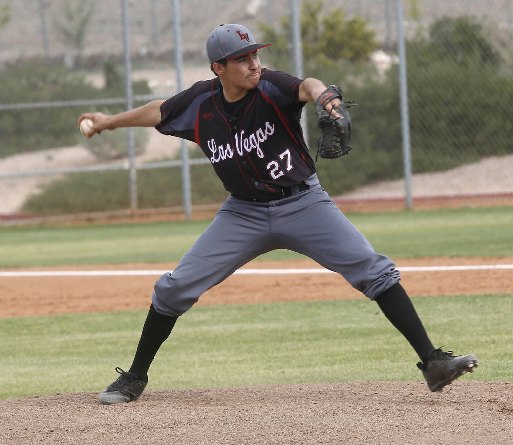 Las Vegas’s Diego Delgado (27) pitches during the first inning of a high school baseba ...