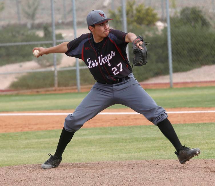 Las Vegas’s Diego Delgado (27) pitches during the first inning of a high school baseba ...