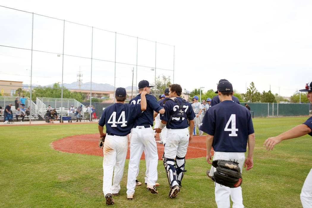 Spring Valley celebrates its 11-3 win against Sierra Vista High School at Spring Valley High ...