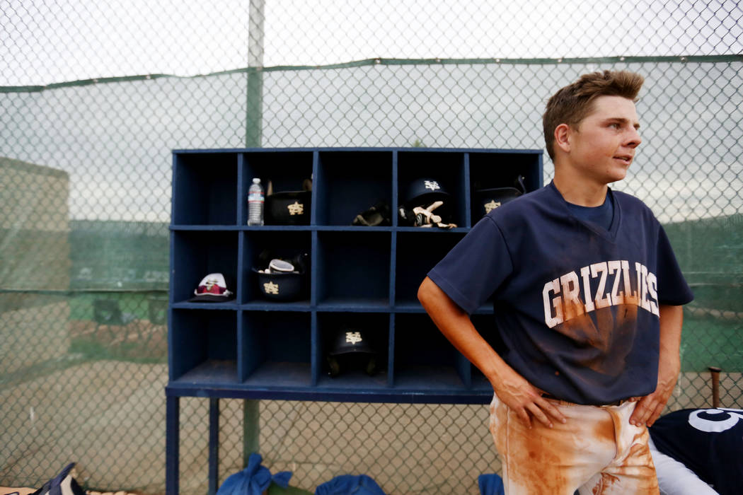 Spring Valley’s Kade Higgins catches his breath after scoring in the fifth inning inni ...