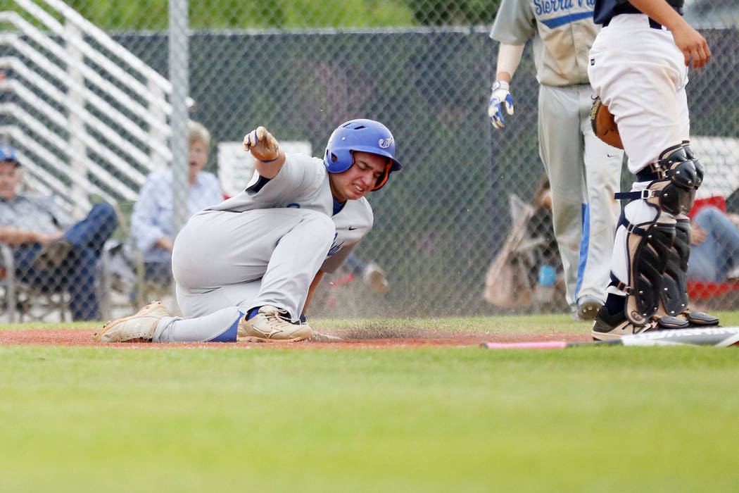 Sierra Vista’s Matt Vanderberg slides into home during the fifth inning against Spring ...