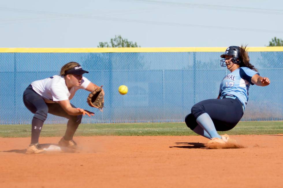 Centennial senior Brianna Benoit, right, slides safely into second for a stolen base as Shad ...