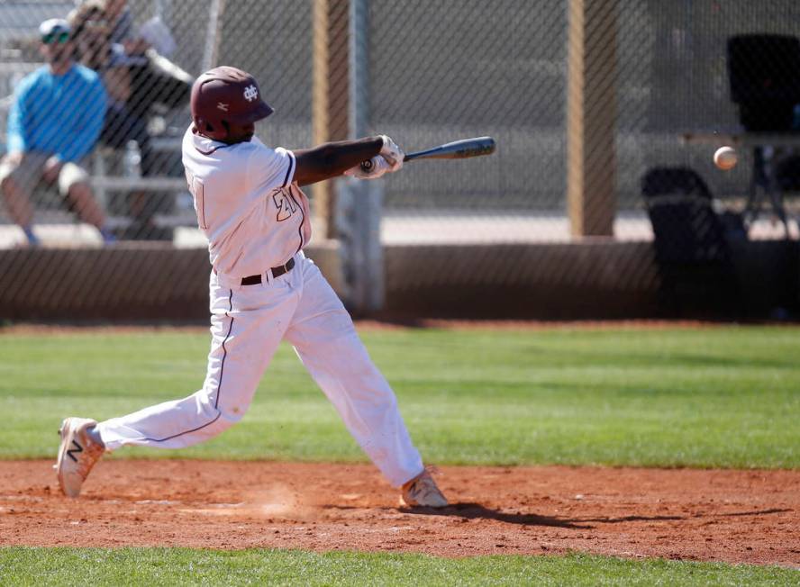 Cimarron-Memorial’s Lasith Narasinghe (21) swings during the first inning of a high sc ...