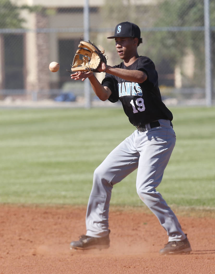 Silverado’s Caleb Hubbard (19) catches the ball during the fourth inning of a high sch ...