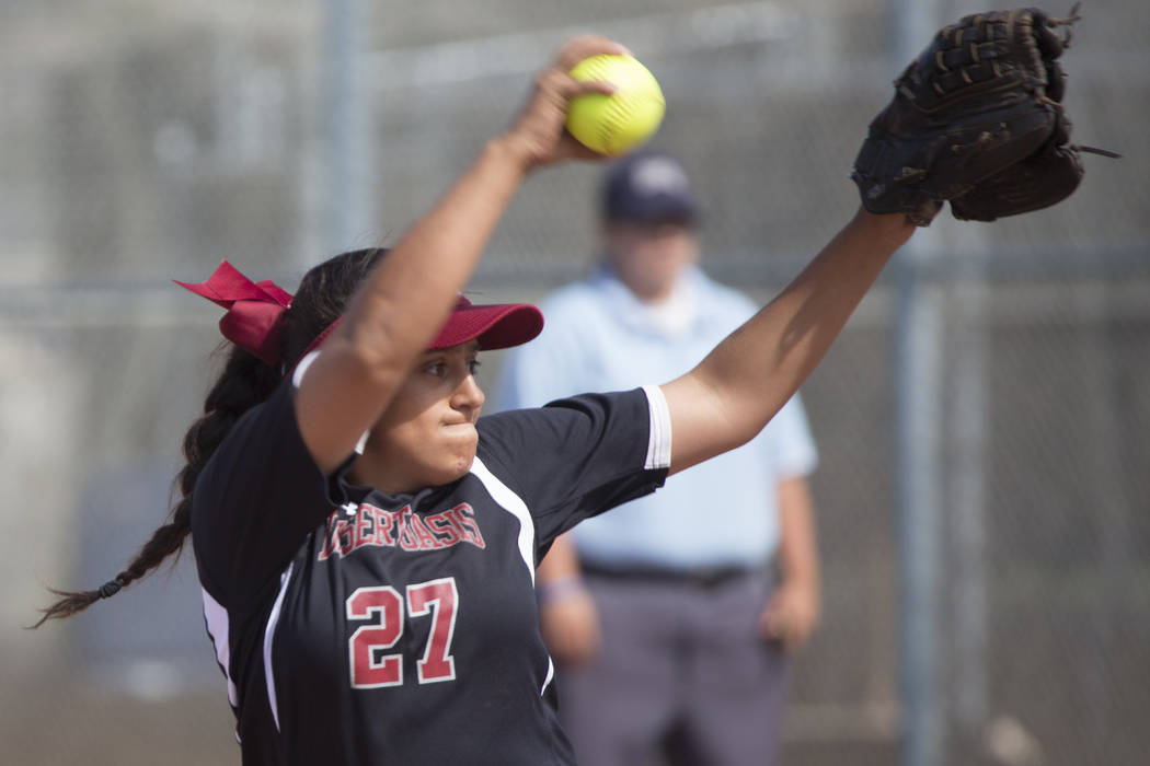 Desert Oasis senior Elsy Guzman pitches to Durango during a game at Desert Oasis High School ...