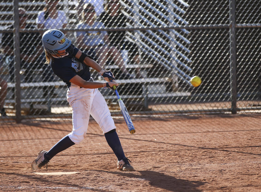 Foothill’s Katelyn Enzweiler (27) hits the ball against Liberty during a baseball game ...