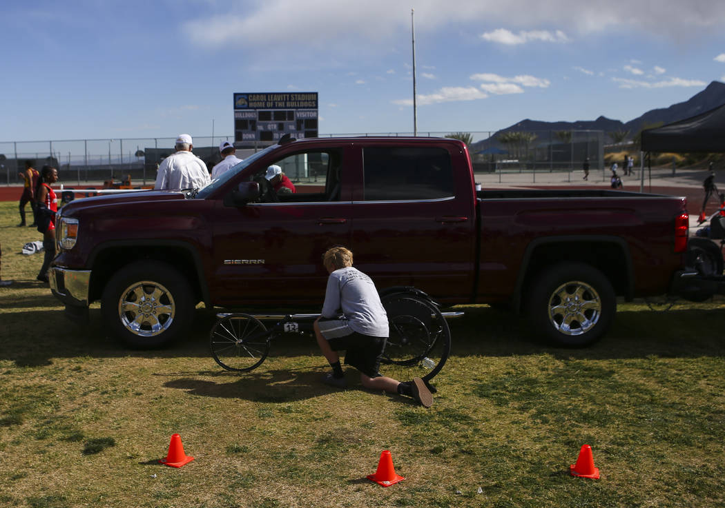 Palo Verde’s Ben Slighting checks his wheelchair before competing in the 1600-meter ru ...