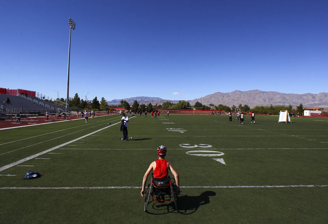 Arbor View freshman Blake Dickinson prepares to compete in the 100-meter dash during a track ...