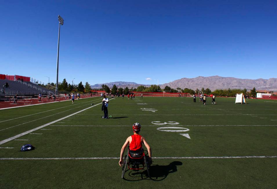 Arbor View freshman Blake Dickinson prepares to compete in the 100-meter dash during a track ...