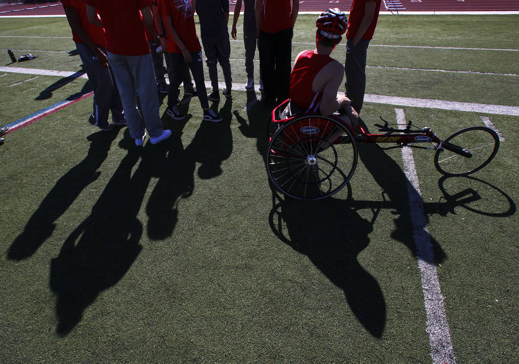 Arbor View freshman Blake Dickinson prepares to compete in the 100-meter dash during a track ...