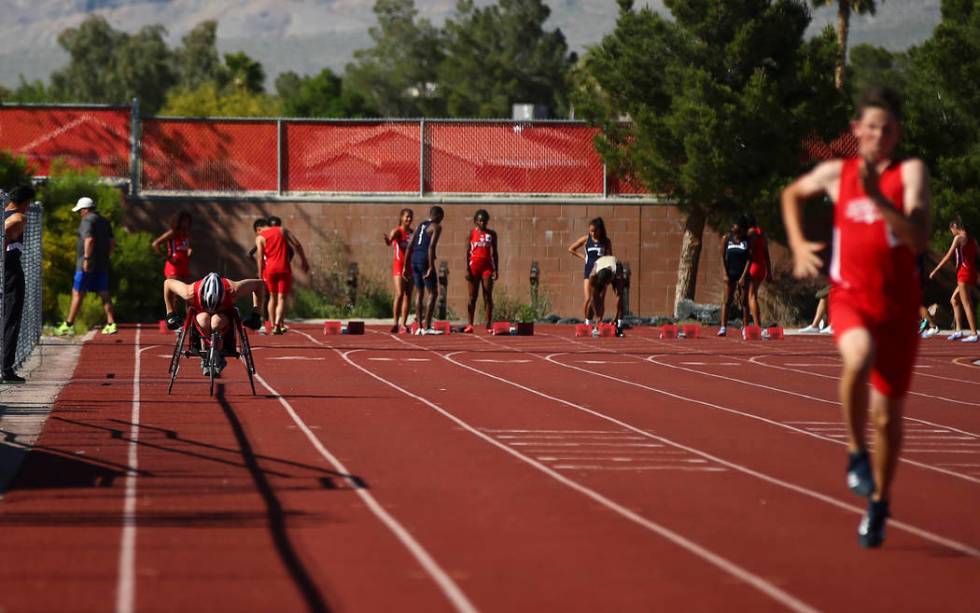 Arbor View freshman Blake Dickinson, far left, competes in the 100-meter dash during a track ...