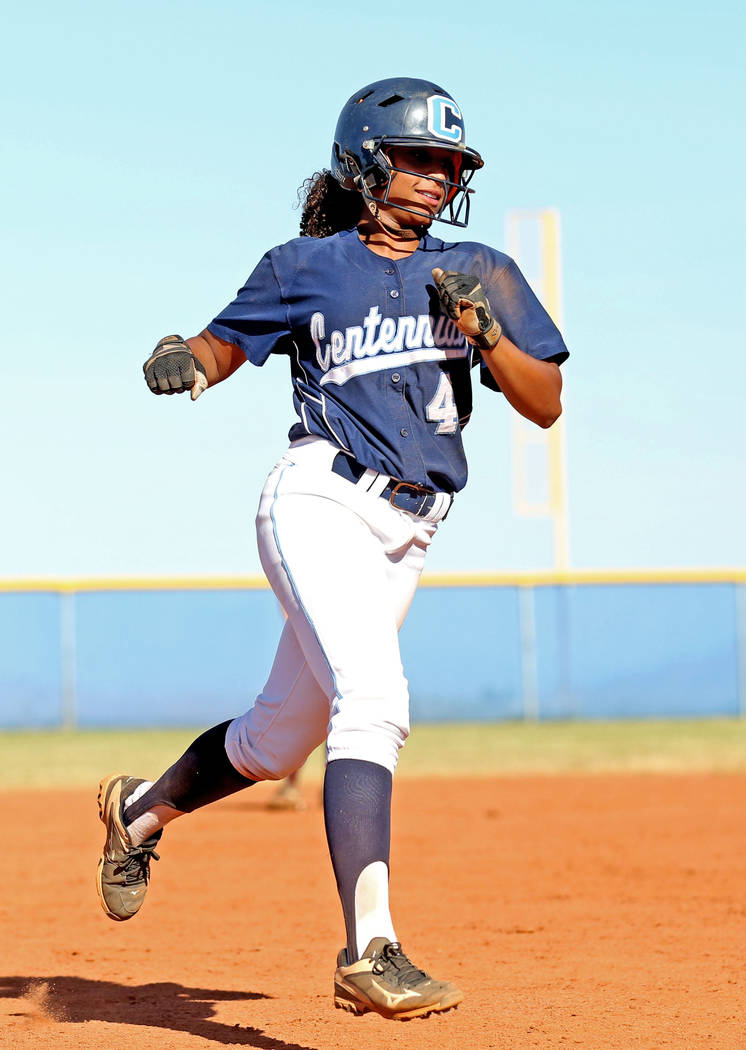 Centennial’s Kiana Tate makes a run after hitting a home run in the fourth inning agai ...