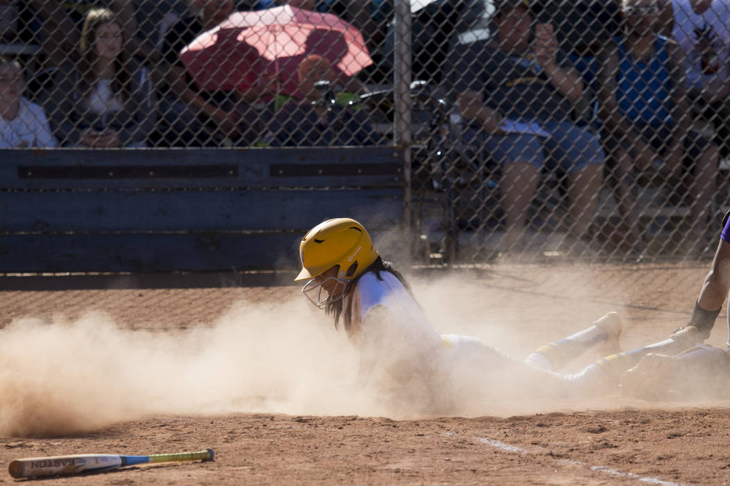 Sierra Vista’s Andrea Barajas (9) slides home for a score against Durango at Sierra Vi ...